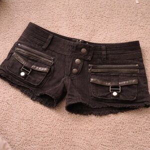 Adorable brown jean shorts with zipper and buckle details